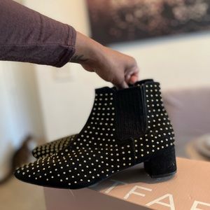 Gold studded ankle boots.